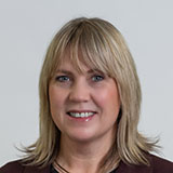 Headshot of B Lewis